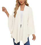 Elegantti edestä avoin kietaisuneule ja poncho