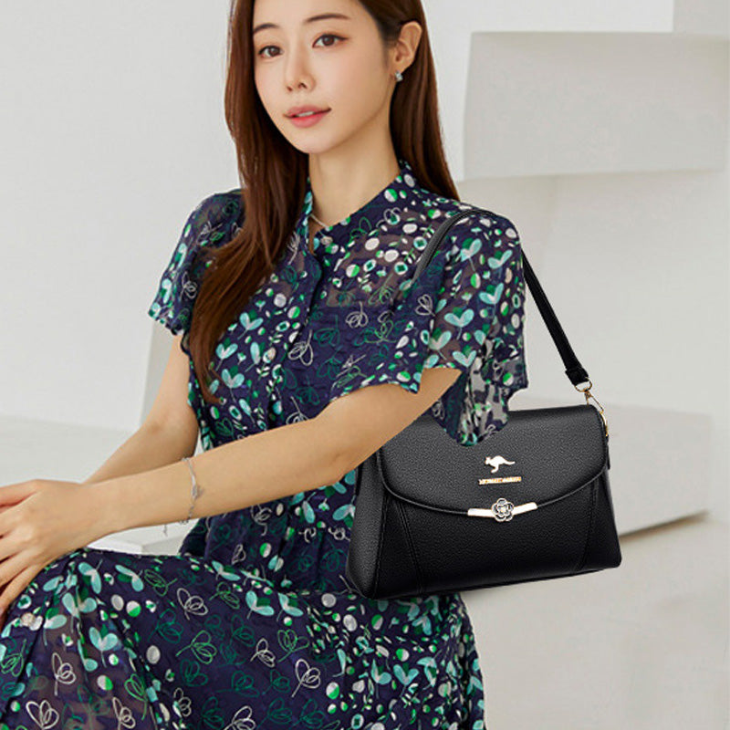Muodikas naisten klassinen ja elegantti crossbody-laukku